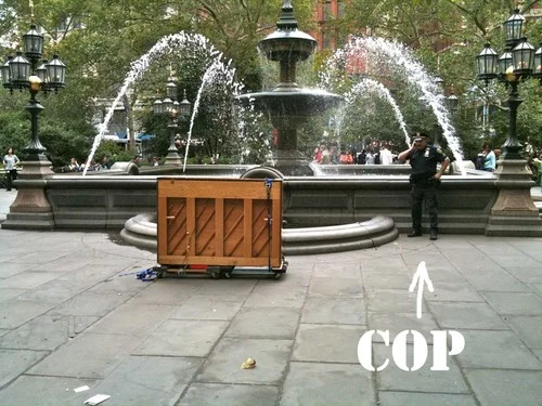 Playing piano at the City Hall Park fountain, September 9, 2010